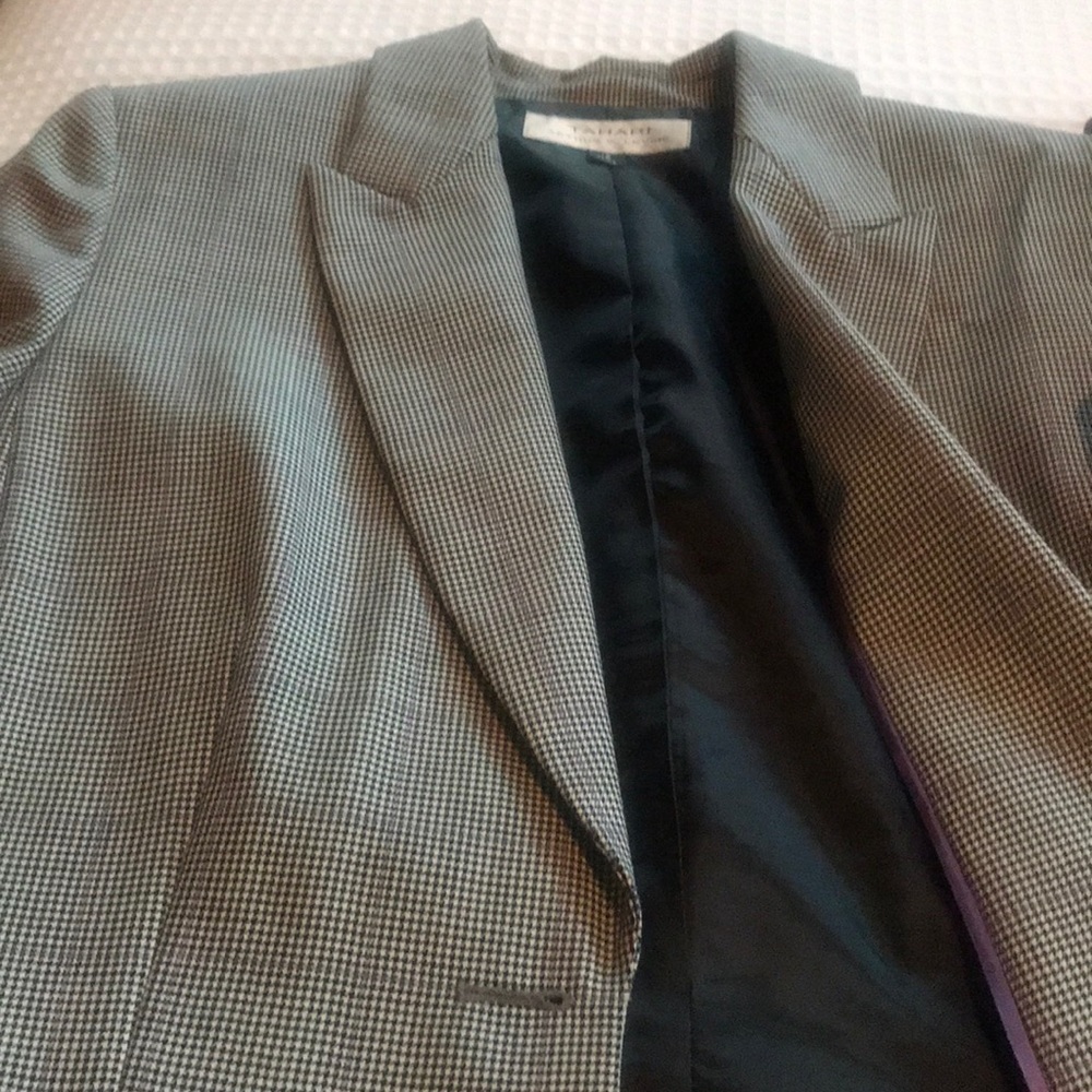 A ladies three piece pant suit.